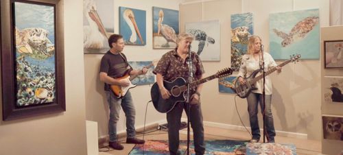 Rene Russell and The Bottom End -Releases Music Video for “Earth Too”. Filmed at The Sandpiper Gallery on Sullivans Island, SC and features artwork by Laura Palermo (Paintings By Palermo).