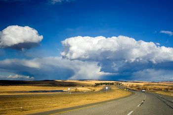 We have worn grooves in the highways of the land. Here is a typical scene from the prairies
