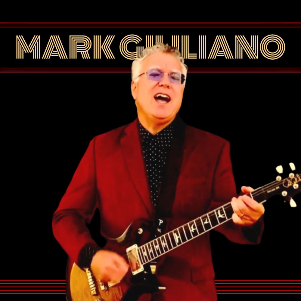 Mark Giuliano playing electric guitar