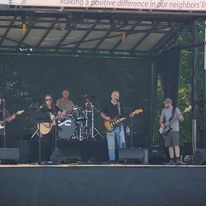 Middle Tennessee Strawberry Festival with Donna Mitchell laying down some mean Mike Campbell licks on "Mary Jane's Last Dance."
