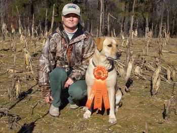 Angie always said that she felt "Dixie" had lots of potential.On 12-7-08 she proved herself right. Chris Adams handled "Dixie" in her first AKC Master Hunt Test and she passed. She was the only documented dog to "line the blind" in the tough second series.
