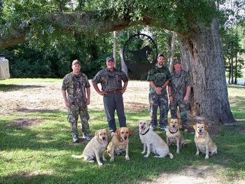 Bob Redfern of Bob Redfern's Outdoor TV Show was on site to film our opening day dove hunt again this year (2009) and also a special segment on our three dogs that qualified for the 2009 Master National Retriever Event in Texas. Look in our links page for his web site which will give you the times and channels that his show airs. I normally catch it on Sunday mornings at 7:45 on Fox Sports South. Purina is one of his major sponsors and at some point during the show you'll see the Purina commercial which features Angie and some of our Labs. Pictured above are Lee Inman, Bob Redfern, Pete Guzik and Jay Hammett and our Labs. These guys were special guest and joined Bob on the hunt. They represented Spartan Fire and Emergency Apparatus, inc. of Spartanburg, SC.
