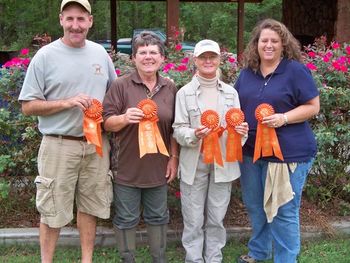 9-18-11 Angie celebrates wtih AKC Master Hunter Judges Brad Slaybaugh, Mary Williams(former NN President and MN Judge) and Michelle Love (MN Judge Candidate) after receiving a Master Hunter Qualifying score for all five of the Elliott Labs at the Down East Hunting Retriever Club Hunt Test in Kinston, NC.
