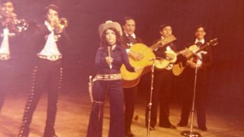 Ybarra accompanied by mariachi during a local San Antonio TV performance.
