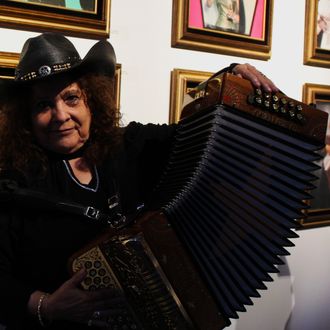 Eva Ybarra poses with her accordion.