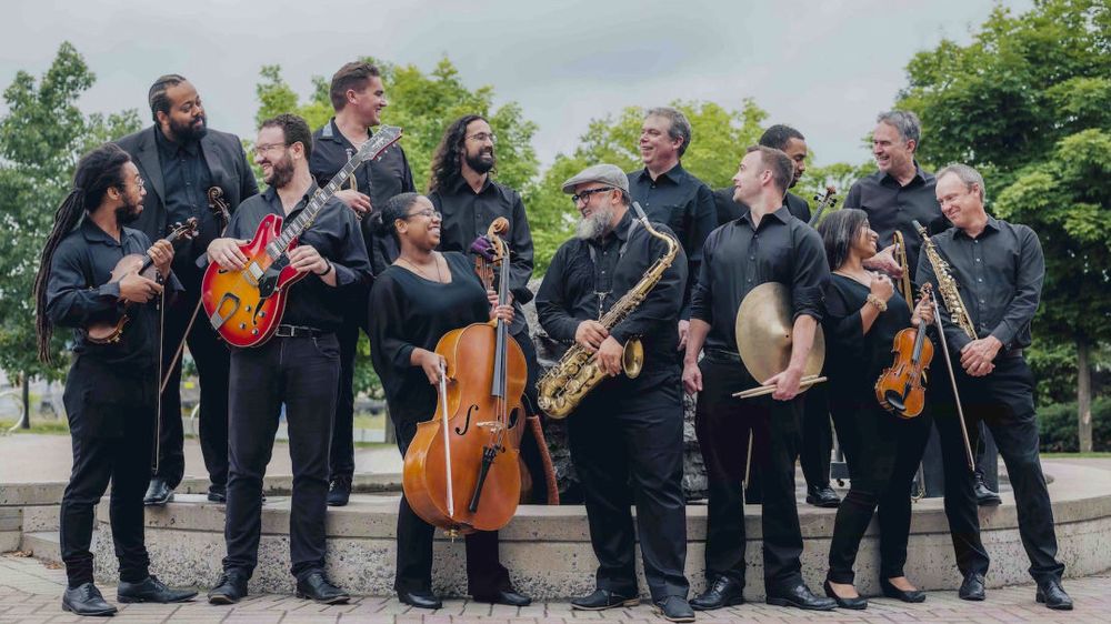 James McGowan Ensemble members posing outside, having conversations 