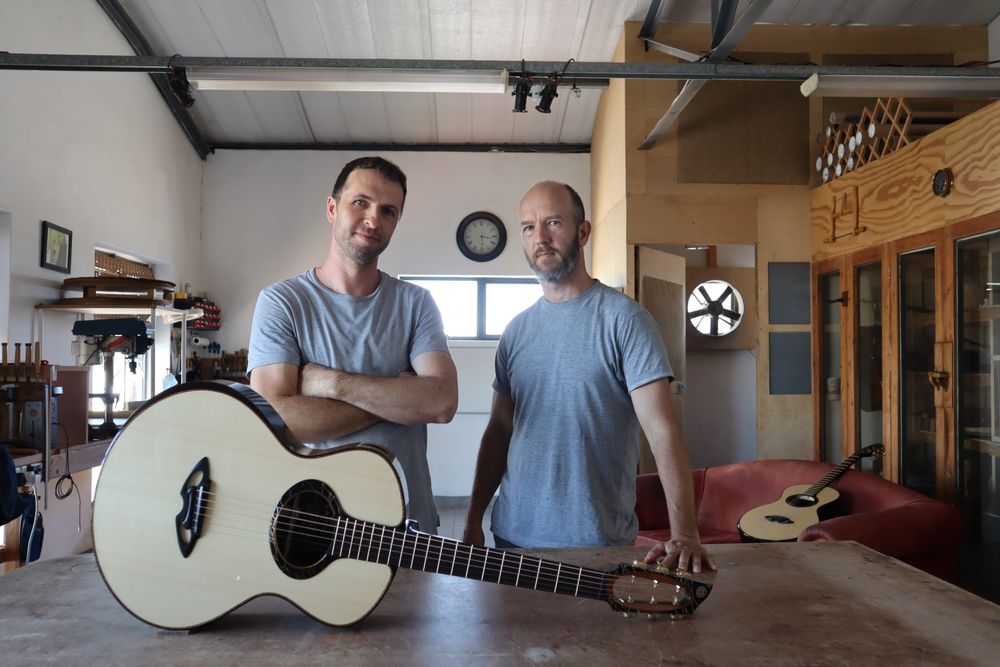 MATTHEW RICE AND MATTHIAS ROUX OF CASIMI GUITARS IN THEIR WORKSHOP IN CAPE TOWN SOUTH AFRICA
