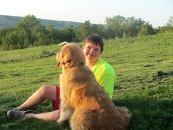 Hanging out on the lawn watching her puppies with Austin
