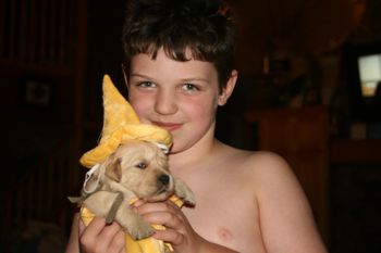 Austin and puppy in mustard costume
