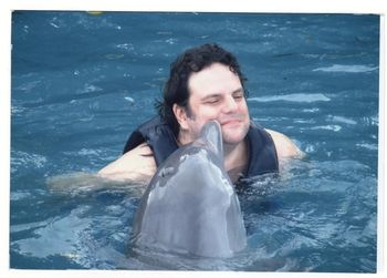 Swimming w/ dolphins in Jamaica.
