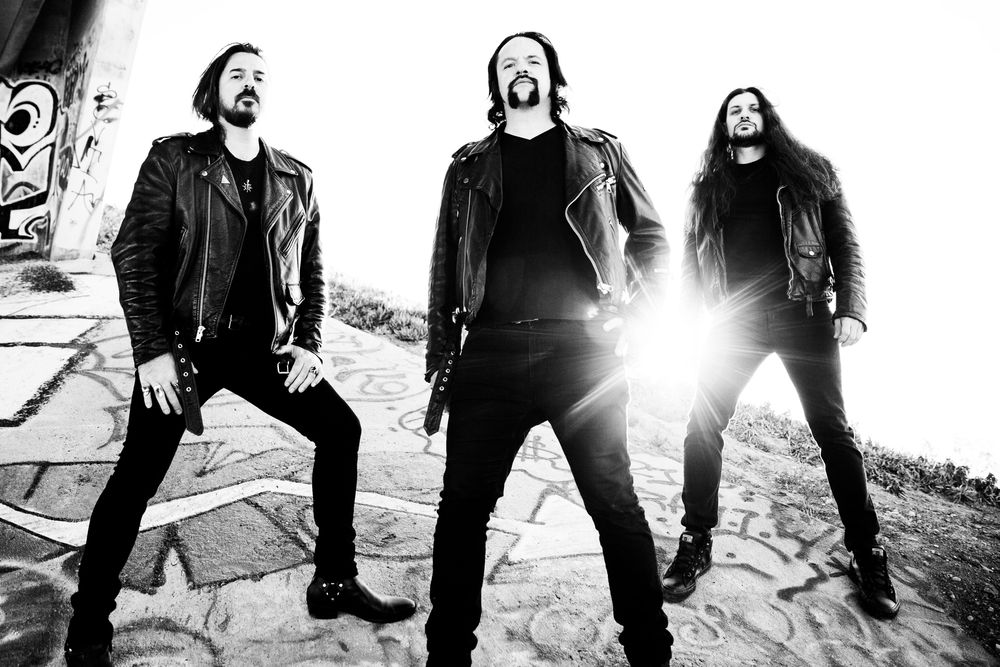 (from L to R) Armand John Anthony - Lead Guitar, Jarvis Leatherby - Bass/Vocals, Dusty Squires - Drums