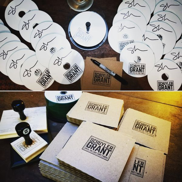 "Until the Last Light Fades" -- Limited run pre-signed CDs in a hand-stamped recycled cardboard sleeve, plus free digital download ($20 + shipping)