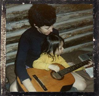 Mary, almost 5 years old, learning guitar
