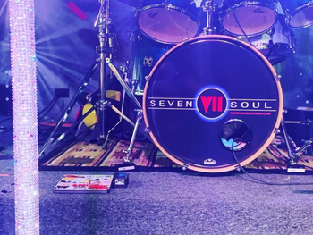 Band name cheatsheet on stage
