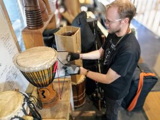 Will working in his previous studio on a djembe pulling table from Goatskins.com