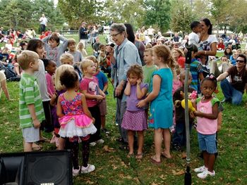 Becky brings in the kids for a group song.
