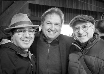 Adam Traum, left, Jens Kruger and Happy Traum backstage at MerleFest 2015
