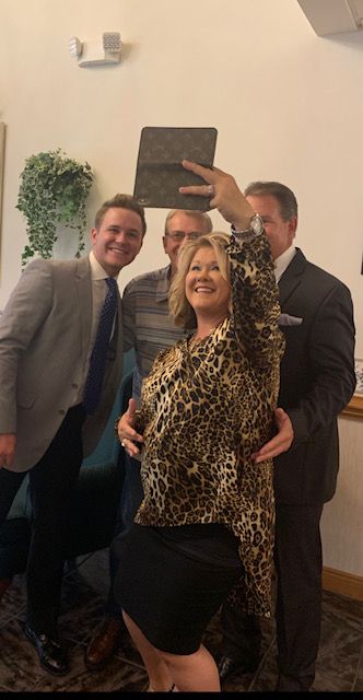 Danny taking a selfie with the Whisnants

