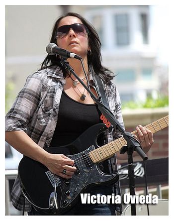 Victoria Ovieda / Guitars, Percussion, Backing Vocals
