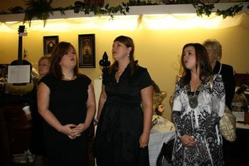 Singing at The Little Black Dress Party for Penny's Mother.
