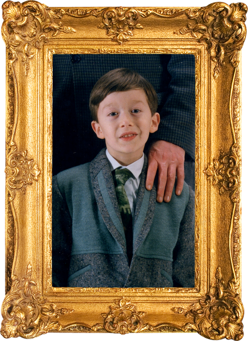 A very old picture of Cataldo Cappiello in his childhood days, presented in a classic decorated golden frame.