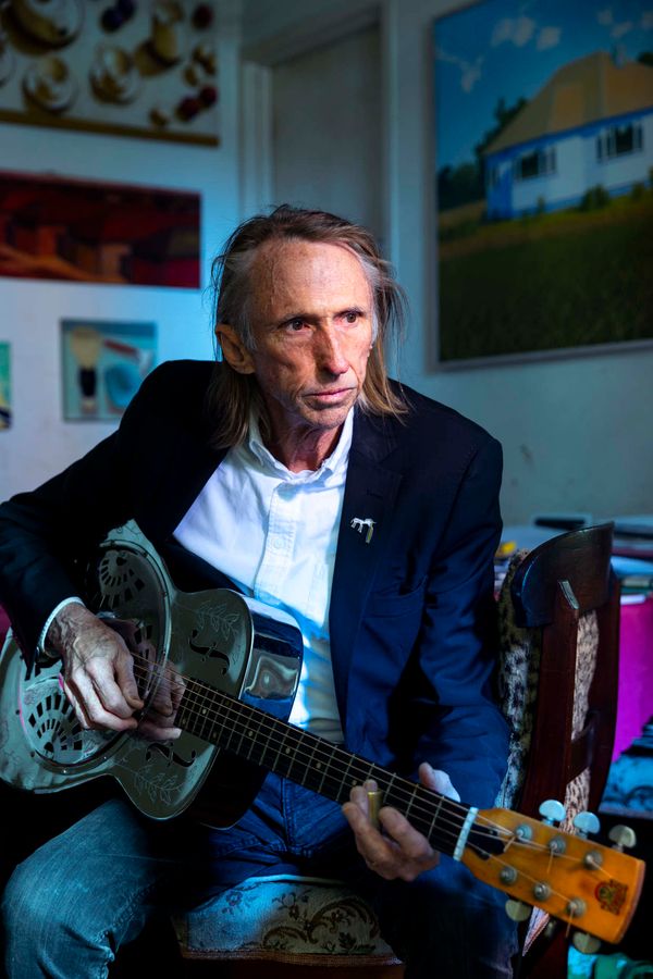 ‘It’s pointless to think about hiding from the aliens’: Reg Mombassa

The artist and Mental as Anything hitmaker has drawn our landscape in paint and song for five decades. Is it getting darker?

By Michael Dwyer
DECEMBER 15, 2022