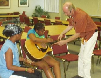 Music education workshops for social service organizations
