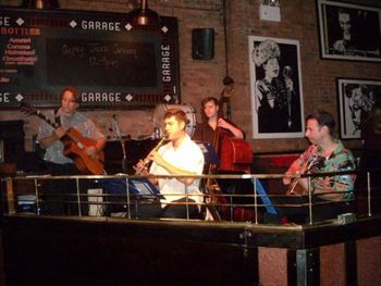 Performing with the Gypsy Caravans: Marc Daine (guitar), Debbie Kennedy. Restaurant Garage, Manhattan, New York City
