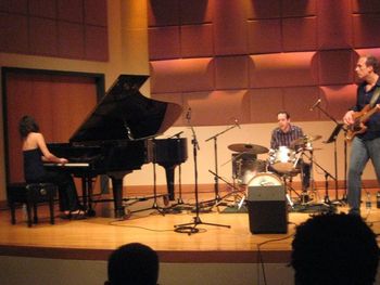 Grinding out some music by Israeli bassist Avishai Cohen with drummer Jeff Asselin and pianist Lika Pailodze. In Clarke Hall at U Miami in 2011
