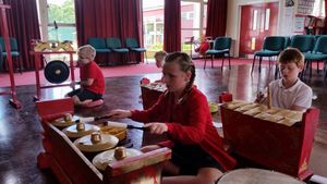 Year 4 pupils concentrate on their Gamelan patterns