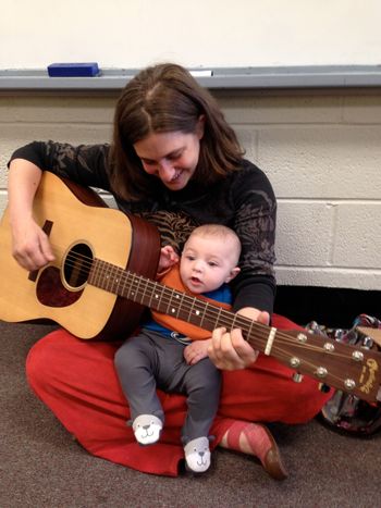 Sometimes I teach music class while holding my child.
