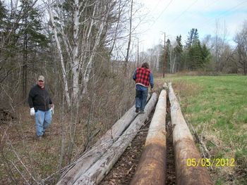 Roger Carmichael & Wayne Keiser checking out the poles for the new bridges.
