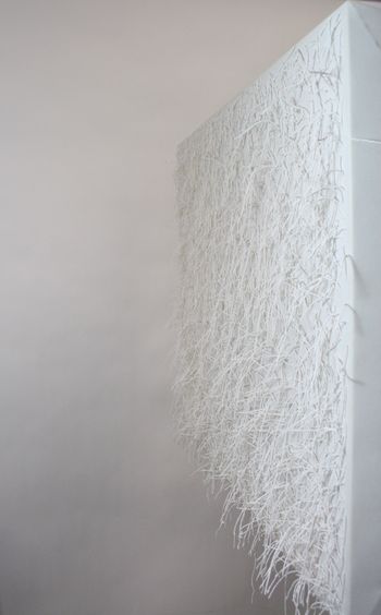 White acrylic strings out of canvas (2011)
