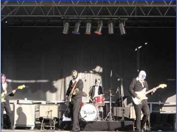 With Los Straitjackets- that's me on the left. What, you don't recognize me?

