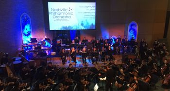 The Nashville Philharmonic Orchestra performing Andre's original piece entitled, "Taking Flight (On This Christmas Night)"
