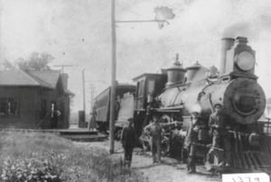 Engine #39 with what appears to be car #302 at Schomberg Junction station. The overhead electrification has already been installed, so this dates the image at 1916, and confirms that  #39 may have replaced engine #14, possibly as early as 1905. Metro  Toronto Library Board.