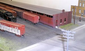 The south end of the Ferguson Avenue, Hamilton freight shed as modelled by Rich Chrysler on his prototypical HO scale layout of the former CNR Hagersville Subdivision. (This layout was featured as part of the layout tour during the 2003 NMRA Toronto [Maple Leaf] Convention). Rich Chrysler photo.