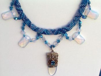 Sold-Peyote stitch, opaline , moonstone and blue topaz
