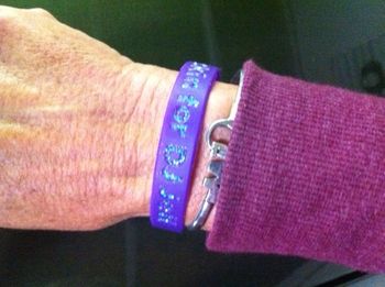 "BLING, BLING, BLING!" Carol blinged her wrist band...all rubbed off by morning but, boy, did it sparkle!
