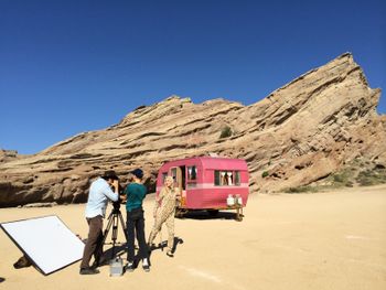 Director Kelly Jones, set dresser Dekland Jones and Amy Raasch at Vasquez Rocks.

