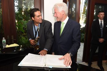 Showing my compositions to President Bill Clinton
