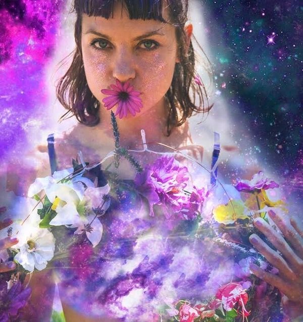 Voice Magazine Interview, Sept 2018
L.A.-based singer, producer, songwriter, and multi-instrumentalist Lavender Fields is both classically trained and completely free of artistic inhibitions.  Wide open to musical influences of all sorts (including sounds she encountered on a trip to India), she uses the Moog, the flute, and her own voice to create original soundscapes that soothe, heal, and enlighten.  She’s just released her debut album, Music Beyond Music, and plans to soon release an EP, Gravitude.  On her European summer tour she launched her “Light Up the World Project,” planting lavender in every city she visited.  Recently Lavender Fields took the time to tell us about her background and raison d’être.

What kind of childhood did you have?
My childhood consisted of practicing classical piano for three hours a day and attending music school and swimming classes.  It was a great childhood.

What role did music play in it?
Major part.  My mother is a piano teacher so classical music was always playing in the house and got ingrained in me early on.

What was your most precious childhood memory?
Probably watching a sunset at the sand dunes by the Baltic Sea.  I will never forget that feeling.  Something about watching the sun rise and set at the beach.  Still love it!

Who—or what—in your life was the best influence on you as an artist? As a human being?
I would say traveling and learning about different cultures, different music and spirituality and being free has influenced me the most as a human being.  And, of course, all the wonderful people I’ve met along the way, but there are so many of them.

Why did you choose to produce experimental music?
Good question! I started out my song-writing journey just playing acoustic music and making songs.  After I learned how to do that I started getting a bit bored with just one instrument and singing.  At the time I was friends with lots of musicians who were into beat music scene, artists like Flying Lotus.

My friend gave me a copy of Ableton [a music creation software] and I was so fascinated with the ability to be your own composer and experiment with different sounds that I learned how to produce.

Ultimately it was the search for new sounds, sounds I’d never heard before, that drove my passion for experimentation.  I’m still constantly looking for new sounds.  I love field recordings.  I have a Moog synth that has literally an infinity of sounds and you can actually create your own instruments by creating new patches on the Moog.  I love it!

How did you find your bandmates?
It’s just me.  Although, sometimes I do have a live drummer or a tabla player, which makes it super fun to perform live.

How did you come up with that wonderful name?
I had a dream about lavender fields about three years ago, while camping in a very beautiful location in Northern California, sleeping under an ancient oak tree.  I woke up under such a strong impression that it drove me to create this project.

Later a friend gave me a book called The Field about a quantum field surrounding all of us.  I started learning about the effects of frequencies on the human brain, producing some binaural beats.

Little by little I find new dimensions of the meaning of “Lavender Fields.” It’s like a mystery that keeps unfolding.  Now I plant a lavender plant in each city I tour in as well.

What do you like best about Music Beyond Music so far?
I love the diversity of the songs on it.  I love the saxophones that James Muschler from the band Moonhooch recorded on a few tracks.  During the making of it we traveled to India and spent two months there studying Hindustani music.  That influenced some of the songs.

Why did you choose that title for your album?
Because there’s a message that I try to convey through my songs.  It’s the wisdom I’ve learned, like music that’s beyond the music itself.  For example, “What makes you beautiful is your heart, what makes you beautiful is your soul —” I feel like it’s an important message.

“Like the Wind” has some deeply felt lyrical lines in it that always remind me of a particular lesson I’ve learned in life: “Look at nature, how it’s flowing, no anxiety . . . Winds are blowing, Leaves are falling, nature sets you free . . .” is one example.  The lesson is not to worry too much and take an example from the natural world, to let things flow naturally.

What’s the story behind the song “Ganga Puja?”
When I was living in Varanasi, India, earlier this year I would wake up daily around four in the morning and head down by the river Ganga, which is revered as very sacred among Indian people because its water comes from the Himalayas.

For the past four thousand years they’ve been having this prayer ceremony called “Puja” at 5:00 a.m.  Young girls from an ashram would come and sing ancient Vedic chants.  I was absolutely mesmerized by it; I sampled them on my little voice recorder.  Then when I returned home I used that sample, came up with a beat, and the song was born.

And “Like the Wind?”
I wrote it when I was spending a summer in the beautiful redwoods by the Pacific Ocean.  The energy of the ocean is so amazing to me.  I tried to imitate the cleansing and flowing effect of ocean waters in this song.  Then the second verse is about our true nature being light that’s inside of every one of us.  I would love all people to recognize themselves as that beautiful light, despite all their imperfections.

The third verse is my favorite.  I think it was a quote from a spiritual text I was reading about, pondering on the flow of things in nature.  Things just happen, without worries, without anger or obsession.  Seasons change and leaves change color.  It’s nice to realize that and apply it in our lives to give it more fluidity and less stress.  Because when you look at nature it’s always incredibly peaceful and flowing.

How do you regenerate after giving yourself heavily to the music?
Music regenerates me.  Every time I feel down all I have to do is start singing and I immediately feel 100% better.  Music is incredibly healing to me.

What conditions do you need in your life in order to maintain your creative output?
Peace of mind.  Peace in my heart.  A place to record too and unconstricted time.

Are there any books, albums, or films that have influenced your work?
I love reading spiritual literature: The Bhagavad Gita, The Alchemist, Bible, Rumi’s poetry, listening to Bob Marley, who’s my biggest musical inspiration because he was able to reach deeply into the hearts of people of all walks of life, anywhere in the world.  It’s powerful.  Uniting people though music is very powerful.

I also find Alice Coltrane’s work deeply inspiring and transcending.  Her album Journey to Satchinanda is such a gem, I can listen to it an infinite amount of times and literally never get tired of it.  A Love Supreme is amazing too! Some John Coltrane, but mostly Alice.

Do you follow a spiritual discipline that helps you stay balanced?
Absolutely.  Everyday.  I wake up and try to take some time to meditate, do yoga, reflect, spend time in nature, connect with the eternal part of my being where I think all of this music comes from.  When I’m on tour and have to drive long distances I always listen to spiritual talk.  Basically always striving to better myself so I can make the most of this life experience, to understand life more deeply.

If you had an artistic mission statement, what would it be?
To bring positivity and light into the world with my music.  #LightUpTheWorld has been my motto — it’s from a song I’ve written with the same name.

What’s next for the Lavender Fields?
I’m about to do my first East Coast U.S. tour.  Planning on touring in Brazil this winter, and Europe in the spring.  I’m opening myself up for all the world touring opportunities, to spread more light and also plant more lavender fields everywhere I go.  I absolute love doing what I do and am ever so grateful for such an amazing opportunity.

