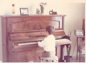 Polo playing piano at  6 years old
