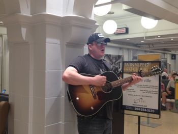 Performing at the VIA Rail station in Winnipeg, Manitoba as part of the Artist on board program
