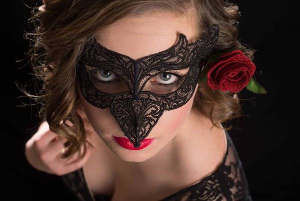 Free standing lace mask with red free standing lace rose. Machine embroidered