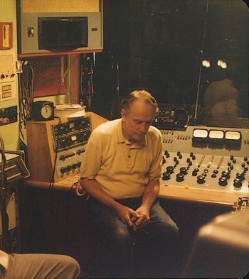 Les listening to an 8-track playback
