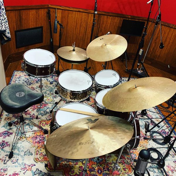 CANOPUS DRUMS 
(Neo Vintage or Mahogany Series):
8x12 Rack Tom/14x14 Floor Tom/14x18 Bass Drum (or a 14x16 Bass Drum)/Hammered Bronze 5.5x14 Snare Drum (Vintage Wires). 

CANOPUS HARDWARE: Vintage Series.

AQUARIAN DRUM HEADS:
TOMS- Texture Coated Single ply on top and bottom. BASS DRUM- Super Kick Coated Single Ply on Batter Head/Response 2 Coated on Resonant. SNARE DRUM-Texture Coated Single ply on top/Classic Clear Snare on bottom (snare side). 

ZILDJIAN CYMBALS: Usual models consist of the Constantinople Series, Kerope Series, or Vintage Old K's.

SALYERS PERCUSSION: 7A Series, Wire Brushes, Nylon Brushes, KG3's, and the 5AK1's. 

For more info on these fantastic companies, check out the links below:  