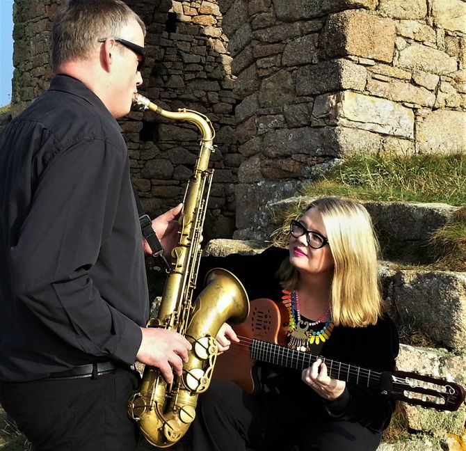 Saxophone and Guitar Duo performing at Grosnez Castle, Jersey