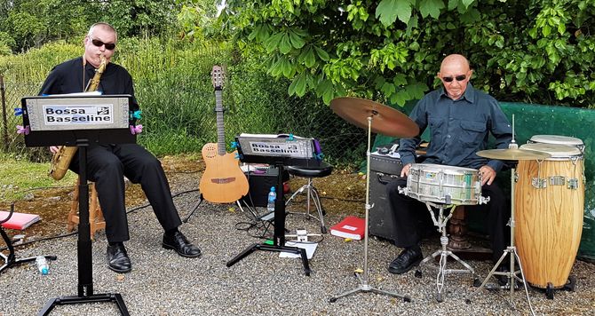 jersey's bossa latin trio setting up in garden for wedding gig