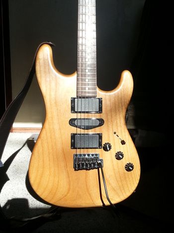 2014: My Unhooked guitar was the most mature version of my hybrid pickup system. It was "unconverted" to a 25.5" scale for my 2015 concert. It ended up as a gift to my engineer/co-producer Norm Robidoux.

